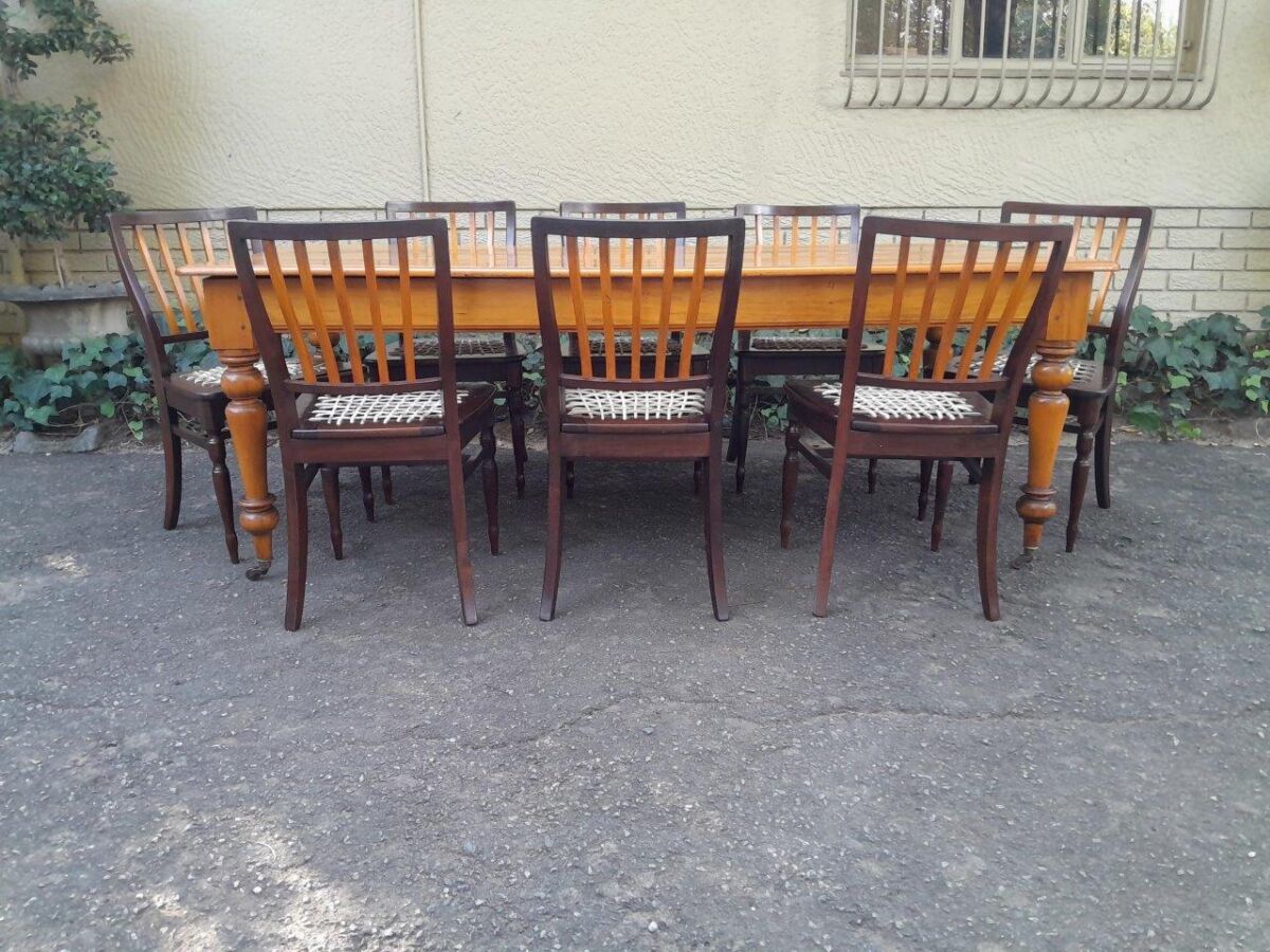 A Late 19thCentury Early 20th Century Yellowwood Dining Table With A