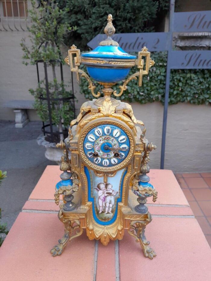 A 19th Century French  Gilt Metal And Porcelain Clock Garniture Set On Original Giltwood Bases And Original Key - Image 9