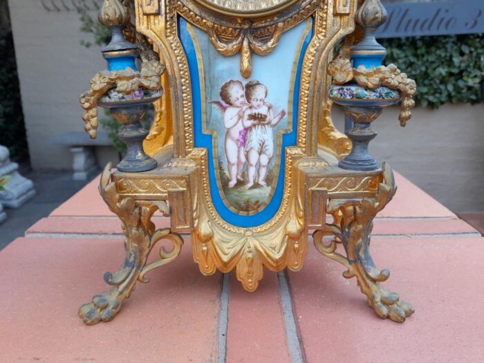 A 19th Century French  Gilt Metal And Porcelain Clock Garniture Set On Original Giltwood Bases And Original Key - Image 11