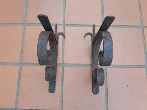 A Pair Of Rustic Wrought Iron Shelf Brackets