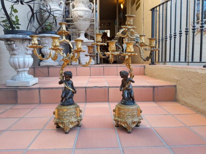 A 19TH Century Large Size Pair of French Louis VI Gilt Bronze Putti Candelabras