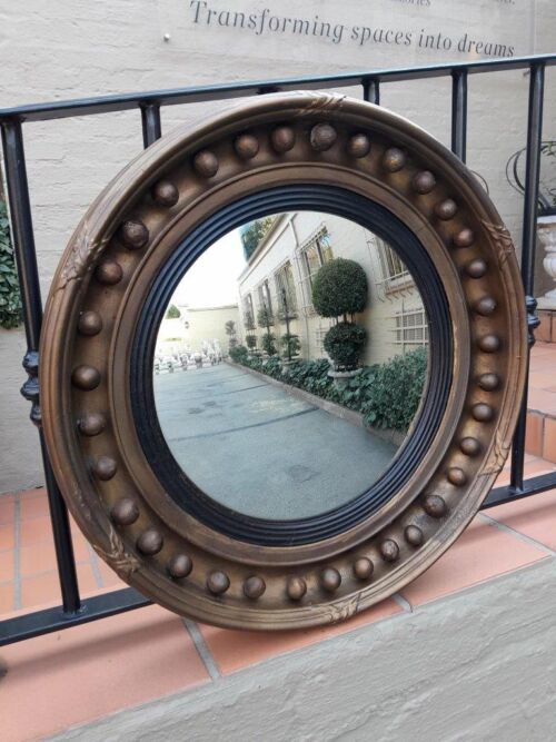 An Antique Gilt-Wood Convex Mirror