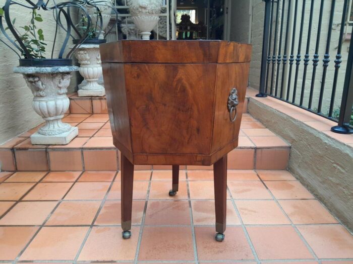 A 19th Century Circa 1850s Victorian Mahogany and Flame Mahogany Cellarette and Brass Plated Masks and Ring Handles and Inner Bin for Ice