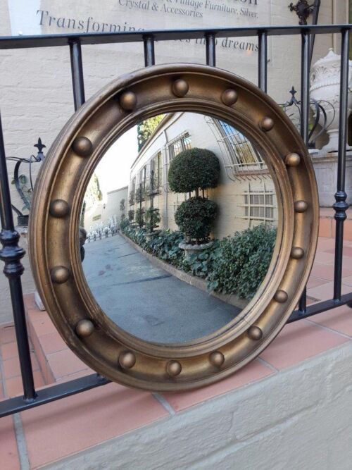 A 20th Century Regency Style Gilt Painted Convex Mirror