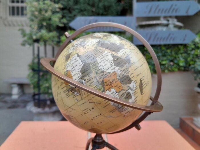 A 20th Century Library Rotating Globe with Brass Mounts and on Wooden Base with Compass - Image 4