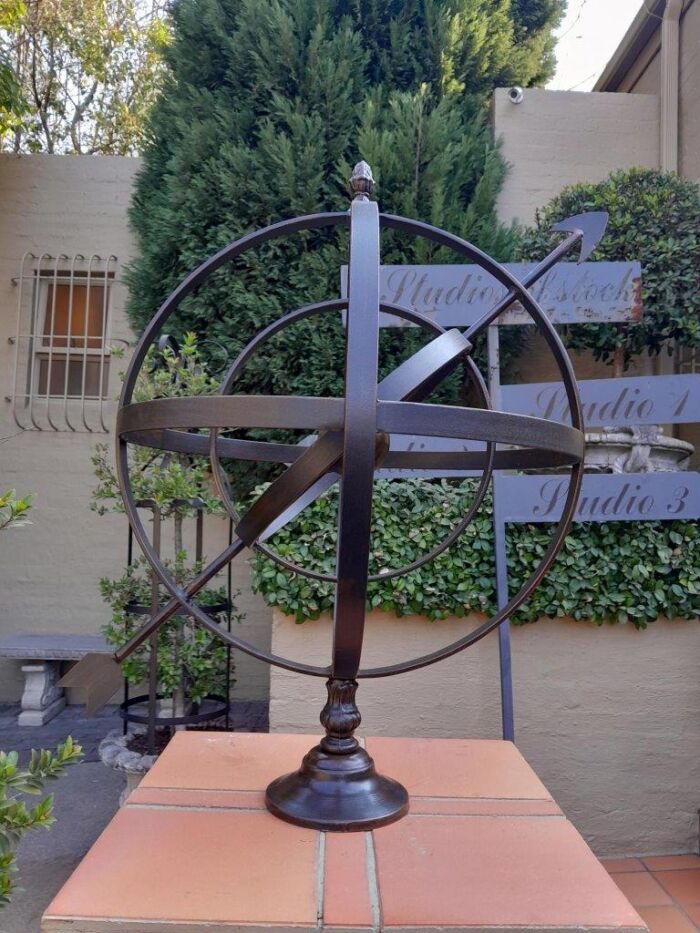 A Decorative Wrought Iron Armillary Sphere in a Antique Brown Finish