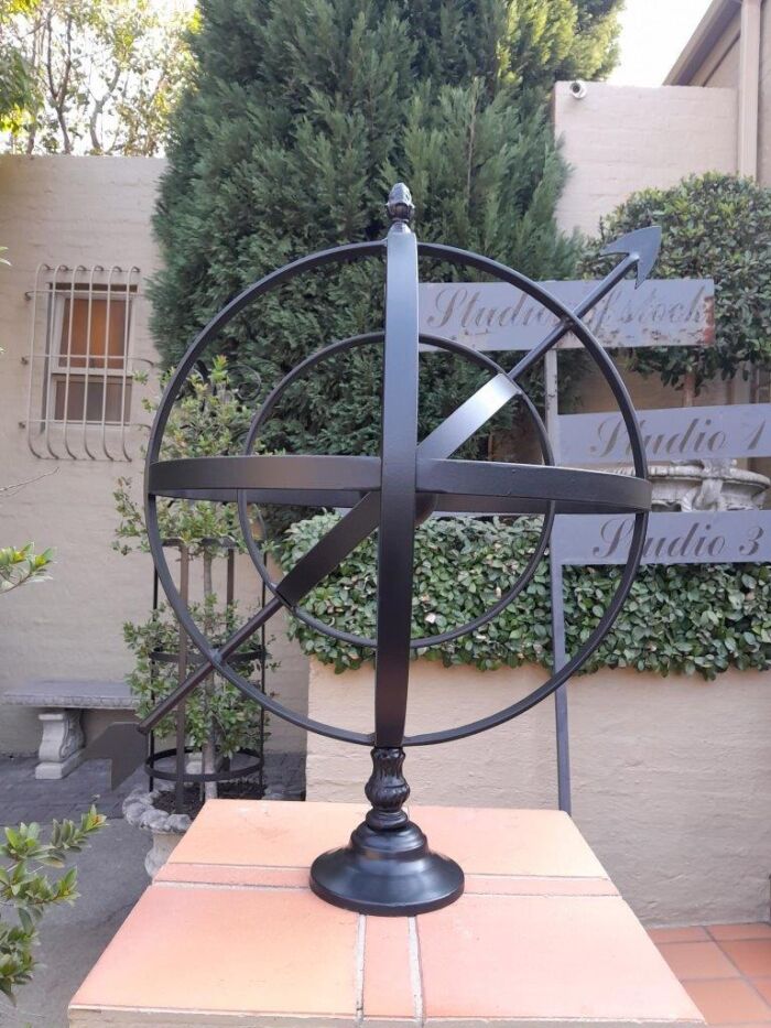 A Decorative Wrought Iron Armillary Sphere in a  Black Finish