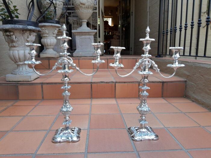 A 20TH Century Pair Of Silver-Plate Candelabras Of Large Proportions