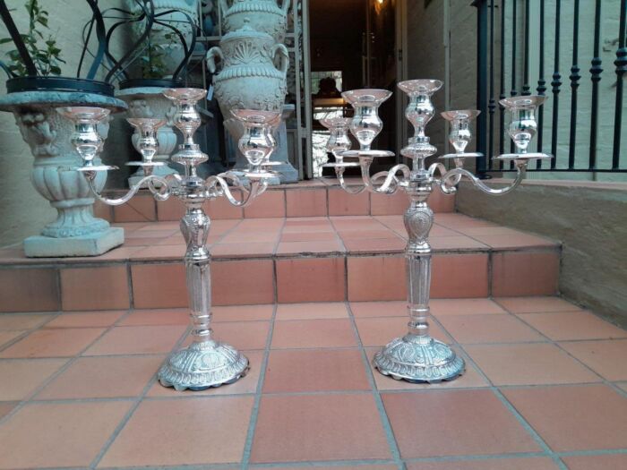 A 20TH Century Pair of Five Arm Candelabras