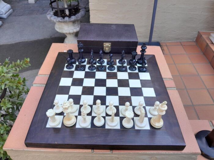 A 20th Century Hand Carved Ebony And Ivory Chess Set With Board And Leather Case - Image 2