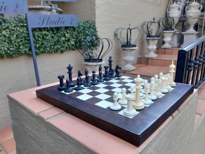 A 20th Century Hand Carved Ebony And Ivory Chess Set With Board And Leather Case - Image 3