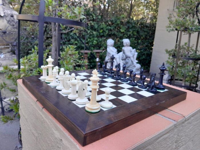 A 20th Century Hand Carved Ebony And Ivory Chess Set With Board And Leather Case - Image 4