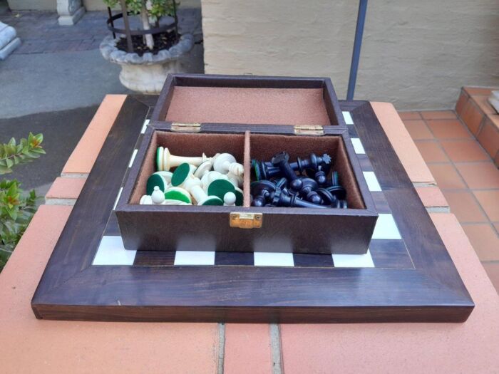 A 20th Century Hand Carved Ebony And Ivory Chess Set With Board And Leather Case - Image 5