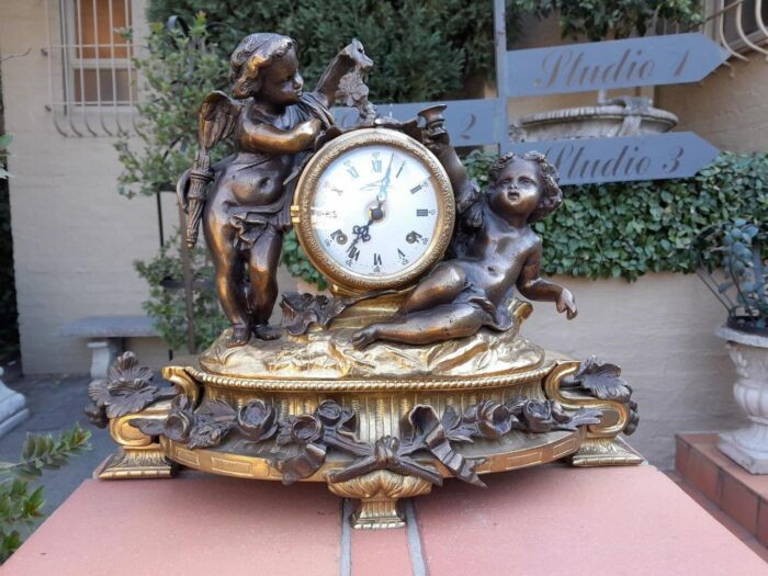 A French Louis XVI Bronze And Gilt Clock