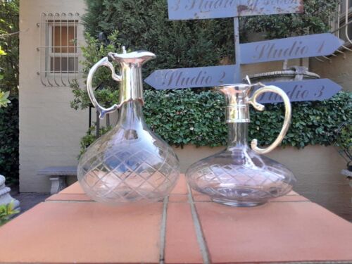 An Early 20th Century Set of Two Silver-Plated Crystal Claret Jugs