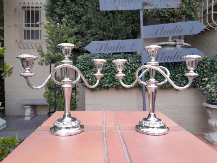 A 20TH Century Pair of Silver Plate Candelabras