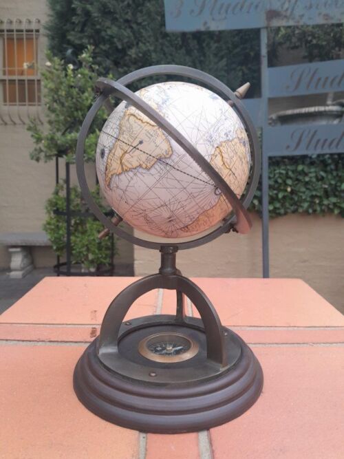 A Brass and Wooden World Globe and with Compass