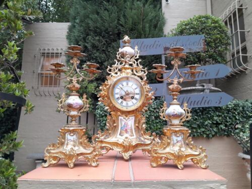 An Antique Century French Rococo Style Clock Garniture Set with Pair of Candelabras  with  Pendulum and Key