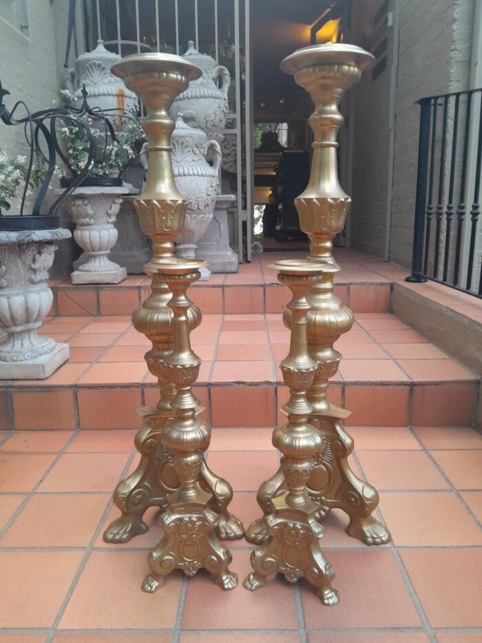 A 20th Century Set Of Four (Two Sized Pairs) Of Solid Brass Rococo Style Candelabras