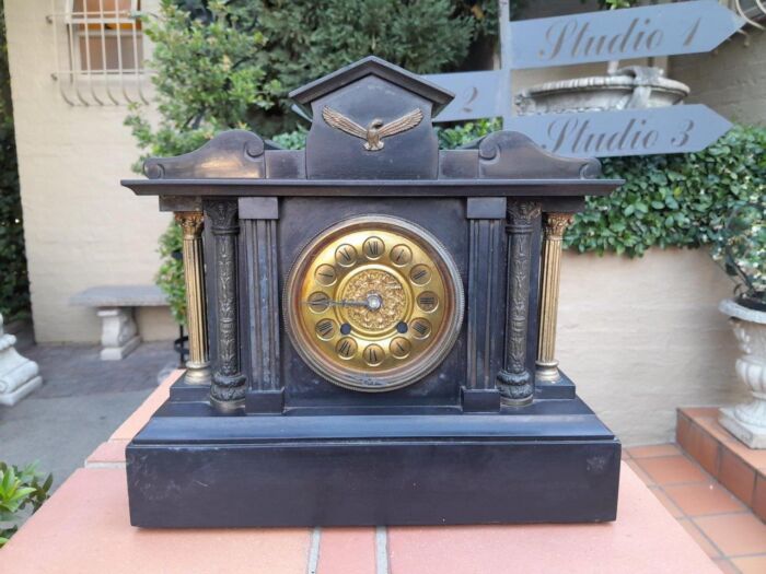 An Antique 19th Century French Style Black Slate Quartz Clock