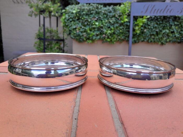 A 2oth Century Pair Of Electroplated Wine / Bottle Coasters