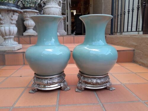 A  20th Century Pair Of Celadon  Vases On Metal Bases