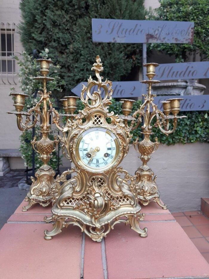 An Antique 19th Century French Rococo Gilt Ormolu Clock Garniture Set with a  Pair of Matching Candelabras