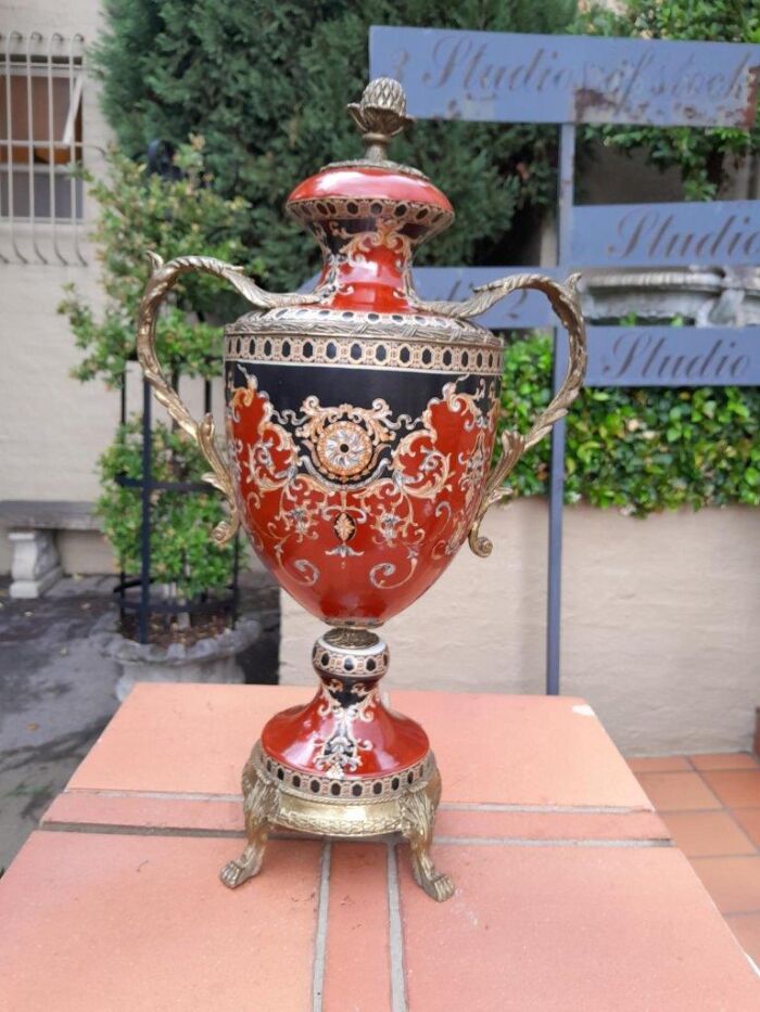 A French Style Porcelain with Metal Mounts Urn