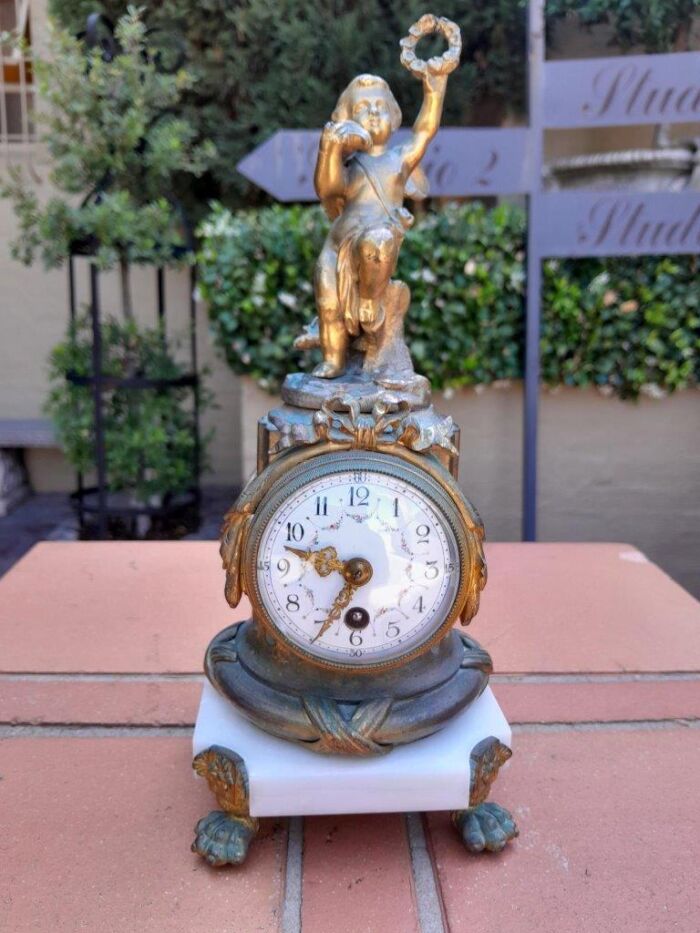 An Antique19th Century French Gilt Bronze Clock with Enamel Dial