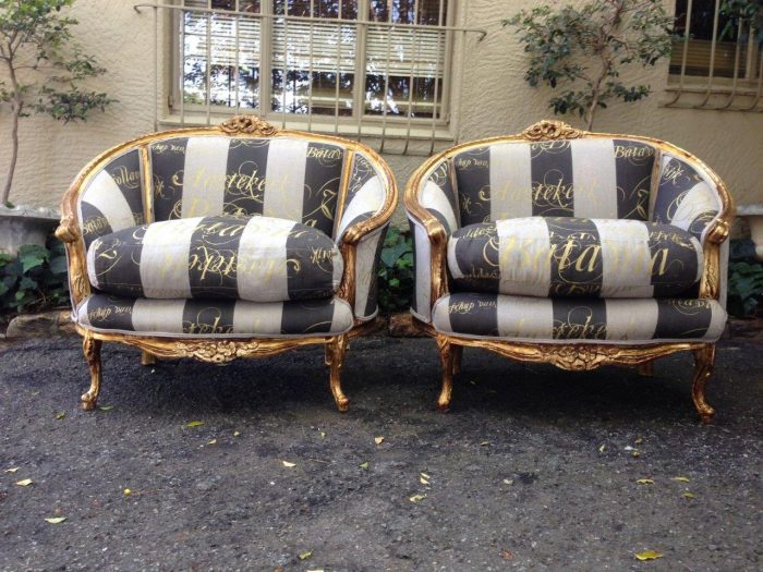 Pair or oversized French Bergere syle gilded armchairs in handmade fabric