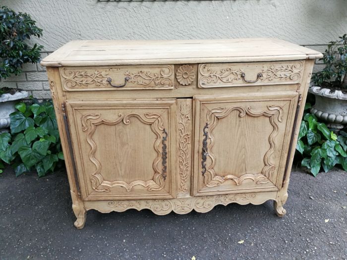 A Provincial Style French Oak Server in a Contemporary Bleached / Natural Wood Finish with Cream Marble Top - Image 3