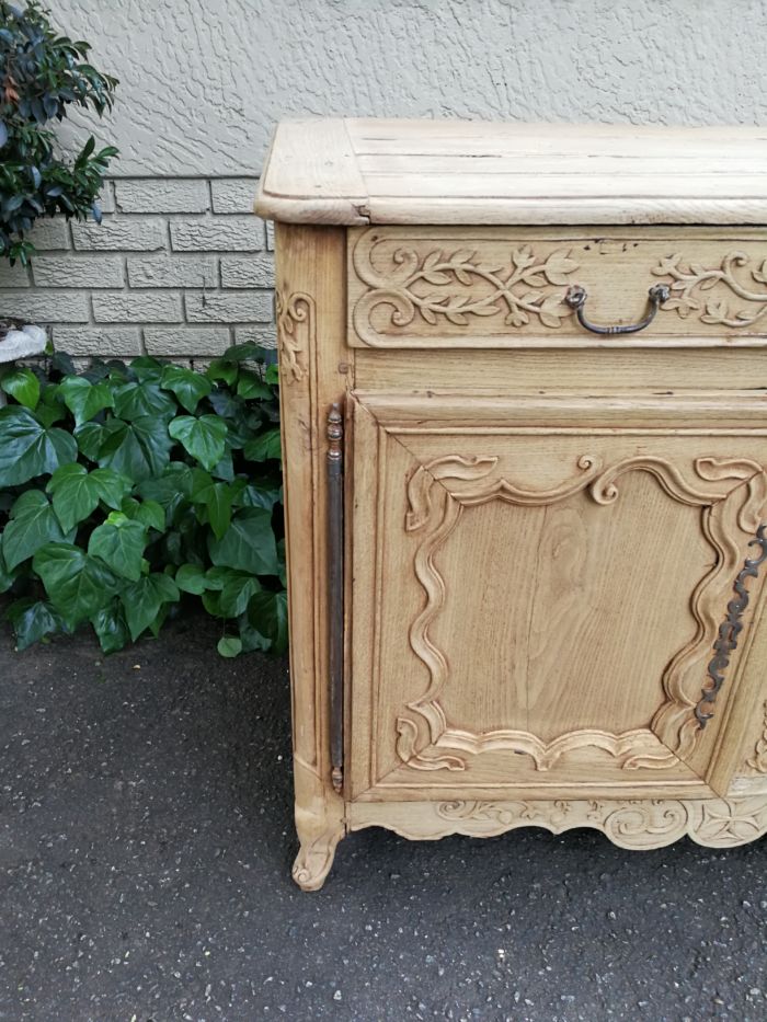 A Provincial Style French Oak Server in a Contemporary Bleached / Natural Wood Finish with Cream Marble Top - Image 5