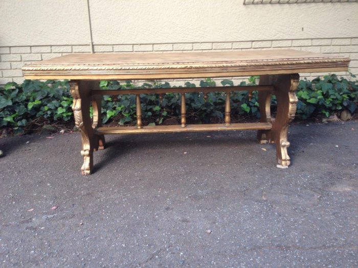 Ornate carved and gilded entrance table