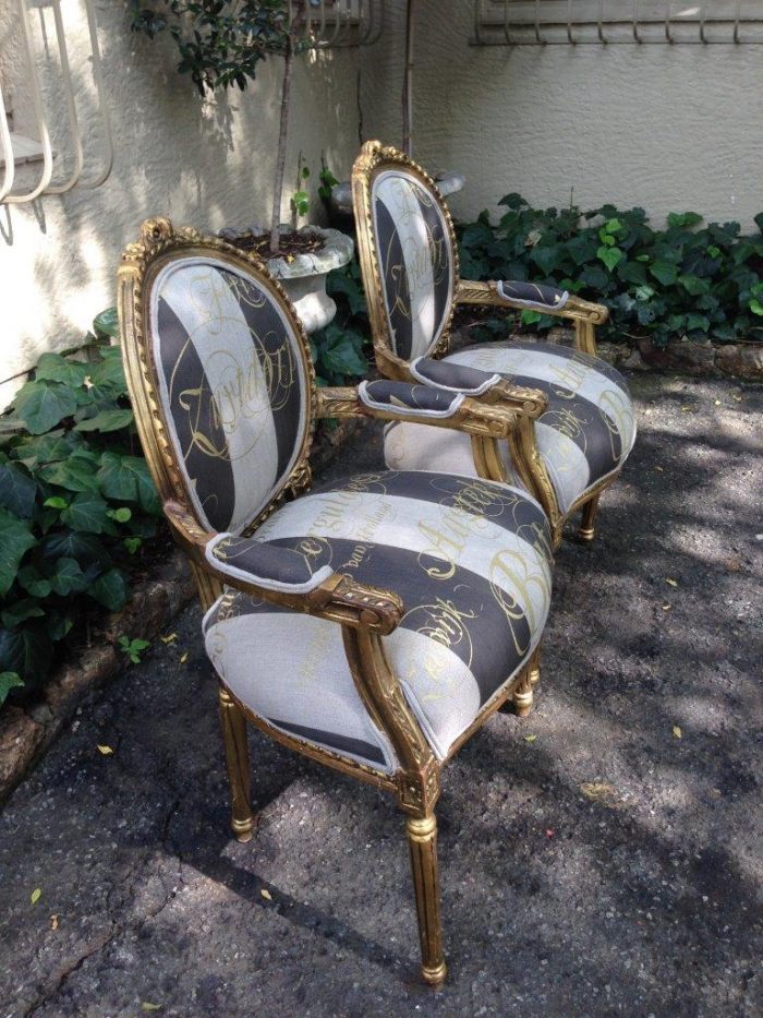 A Pair of French Style Arm Chairs Hand Gilded With Gold Leaf And Upholstered In an Imported Script Fabric - Image 3