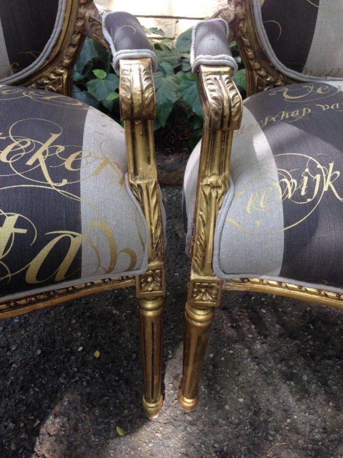 A Pair of French Style Arm Chairs Hand Gilded With Gold Leaf And Upholstered In an Imported Script Fabric - Image 7