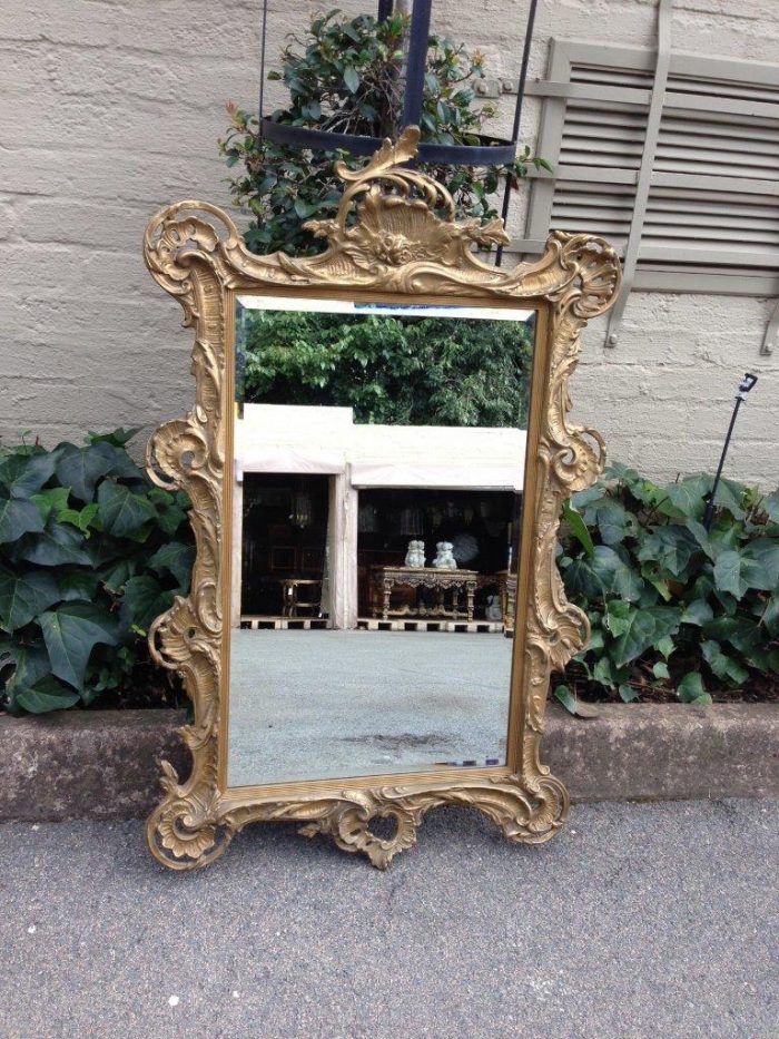 A Gilt Rococo-Style Frame With Bevelled Mirror Plate