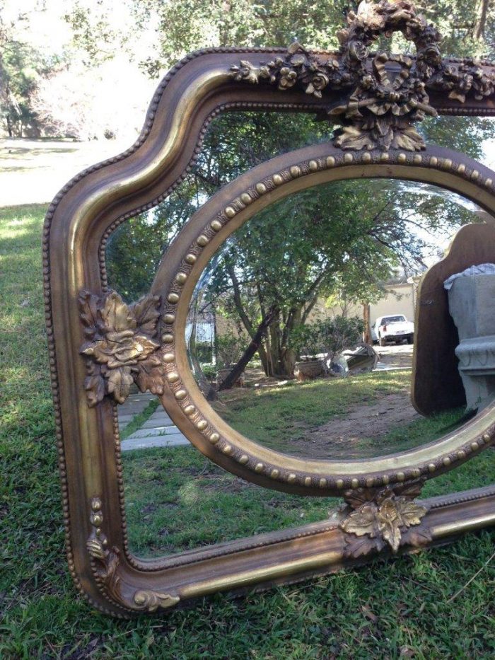 A French Ornate carved mirror with a bevelled oval centre section - Image 3