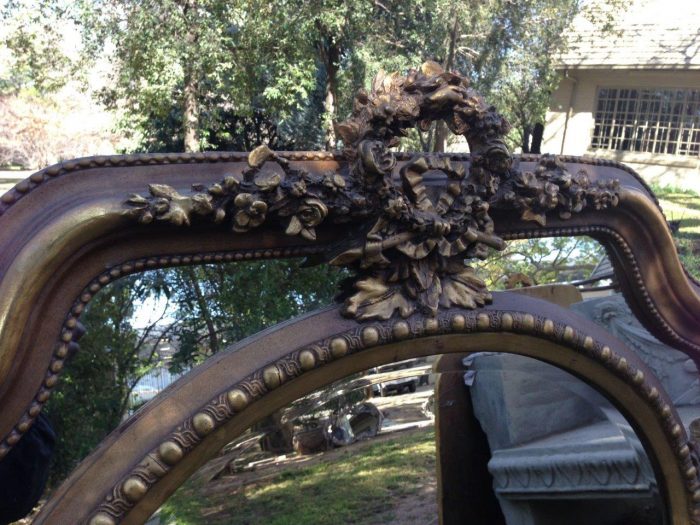 A French Ornate carved mirror with a bevelled oval centre section - Image 5