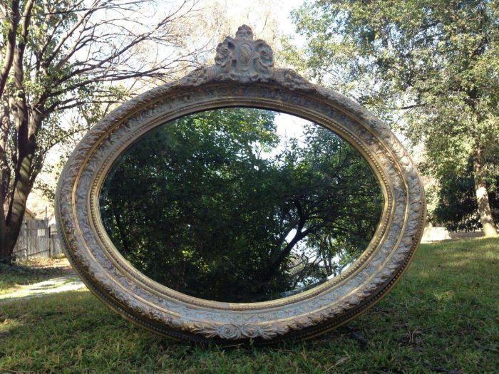 An Oval Ornate Bevelled Mirror - Image 2