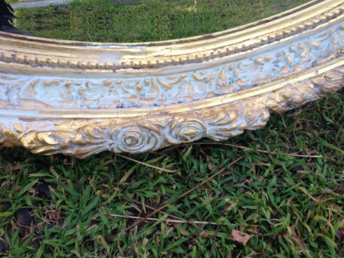 An Oval Ornate Bevelled Mirror - Image 4