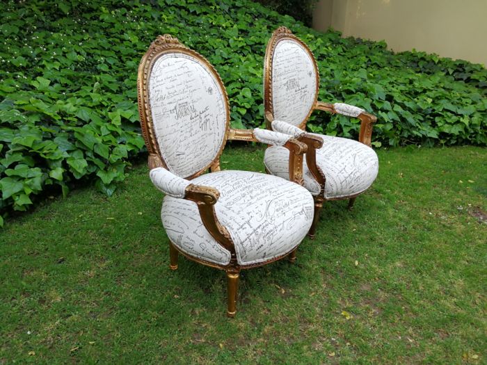 A Pair of French Style Carved and Gilded Armchairs Upholstered in a Custom-made Script on Linen Fabric for The Crown Collection - Image 4