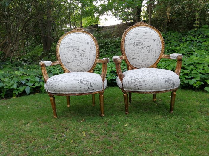 A Pair of French Style Carved and Gilded Armchairs Upholstered in a Custom-made Script on Linen Fabric for The Crown Collection - Image 2