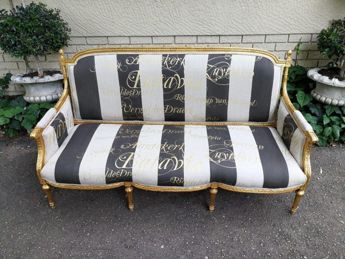 A French Antique Hand-Carved And Gilded Settee, Upholstered In A Hand Painted Imported Linen Fabric With Gold Script - Image 3