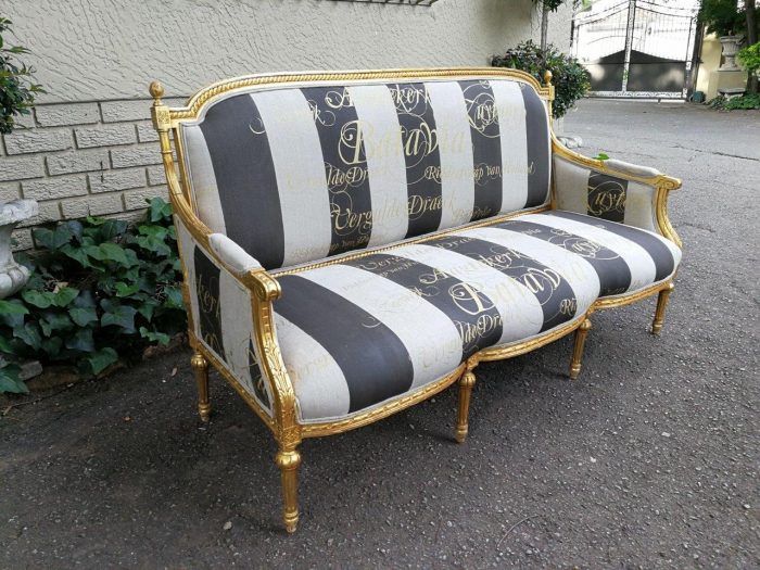 A French Antique Hand-Carved And Gilded Settee, Upholstered In A Hand Painted Imported Linen Fabric With Gold Script - Image 4