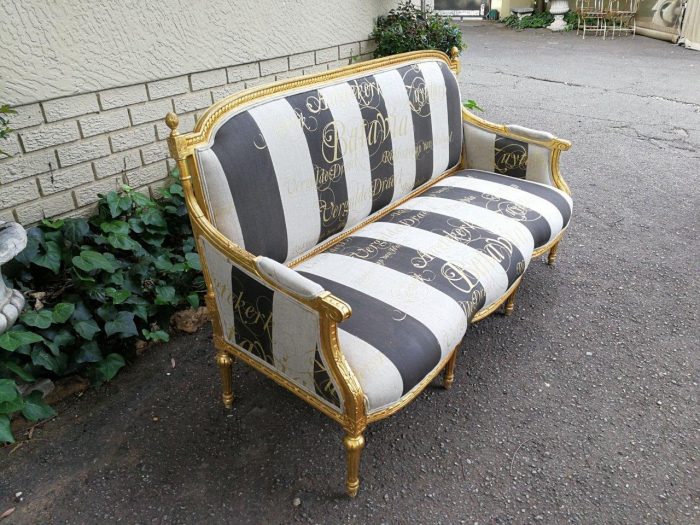 A French Antique Hand-Carved And Gilded Settee, Upholstered In A Hand Painted Imported Linen Fabric With Gold Script - Image 5