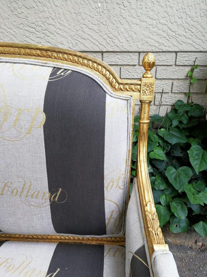 A French Antique Hand-Carved And Gilded Settee, Upholstered In A Hand Painted Imported Linen Fabric With Gold Script - Image 8