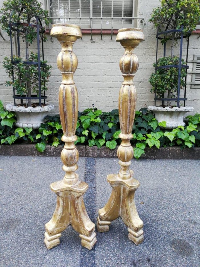 A Pair Of Carved Wooden Candle Holders Hand Gilded With 22-Karat Gold Leaf