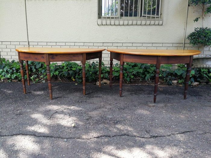 A 19th Century Pair Of Cape Yellowwood And Stinkwood Demi-Lune Tables