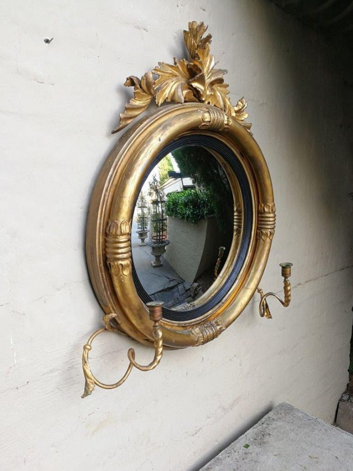 A 19th Century Regency Style Convex Giltwood Mirror