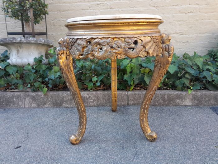 An Early 20th Century Carved and hand-gilded with gold leaf table with Marble Top